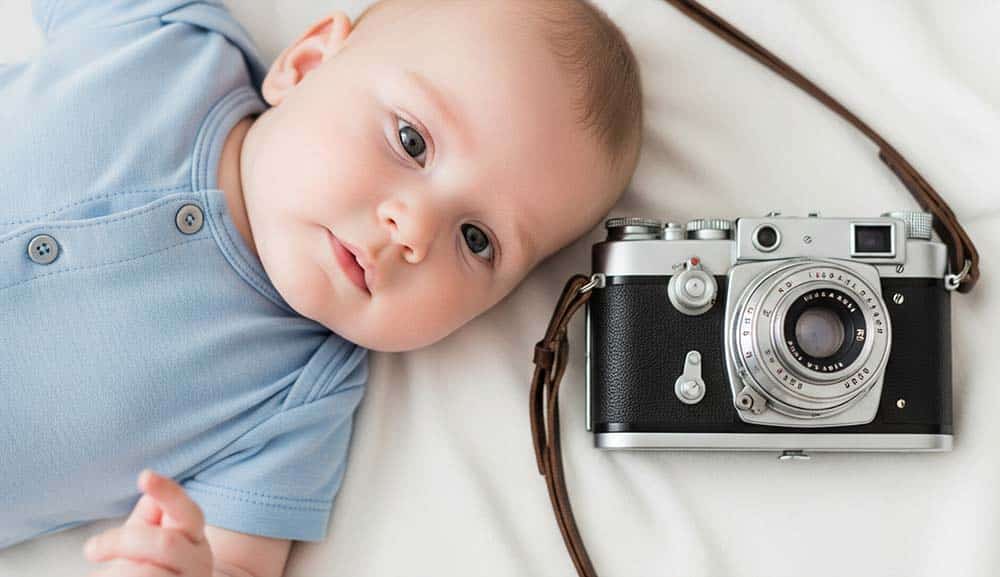 عکس نوزاد و دوربین عکاسی