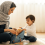 مادری در حال آماده کردن فرزندش برای عکاسی